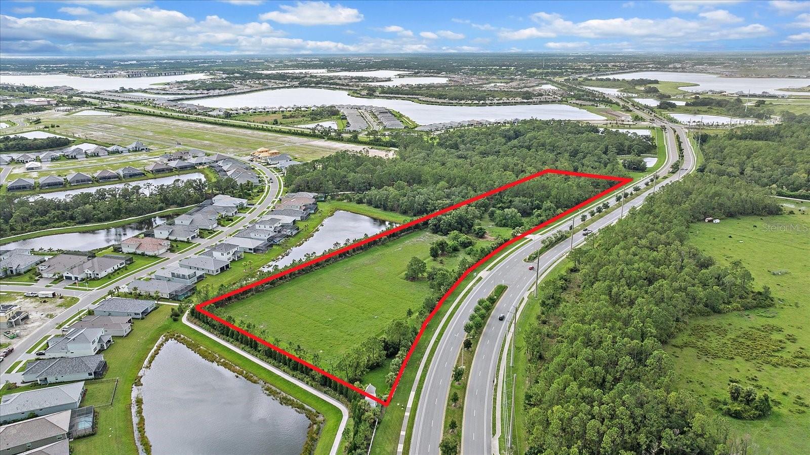 Prime vacant land opportunity located just North of Fruitville Rd, East of I-75 and South of University Parkway. This property allows permitted uses of: Single-Family Detached, Ag Production, Animal Boarding, Barrow Pit, Riding Academy/Public Stables, Parking/Storage of Vehicles and special exceptions including: Farm Produce Stand, Nursery, Animal Hospital/Clinic/Resort, Daycare Center, Animal Shelter, Group Living (e.g. boarding, rehab, ALF), School (Elementary, Middle, or High), Place of worship, Wild Animal Sanctuary, Outdoor Recreation (limited), Sports Academy, Polo Club, Tennis Club, Golf Couse, or a Bed & Breakfast. Once considered remote, this property now sits at the heart of rapid residential growth and infrastructure expansion. With new communities emerging nearby and the extension of Lorraine Road seamlessly linking Manatee and Sarasota counties, this vacant land is uniquely positioned as a prime opportunity for strategic development.