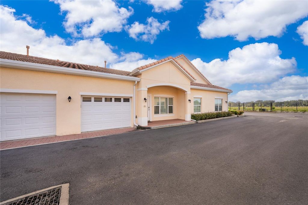 Photo of 2812 Shantiniketan Boulevard #I-12, Tavares, FL 32778 (MLS # O6346905)