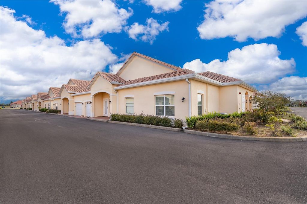 Photo of 2812 Shantiniketan Boulevard #I-12, Tavares, FL 32778 (MLS # O6346905)