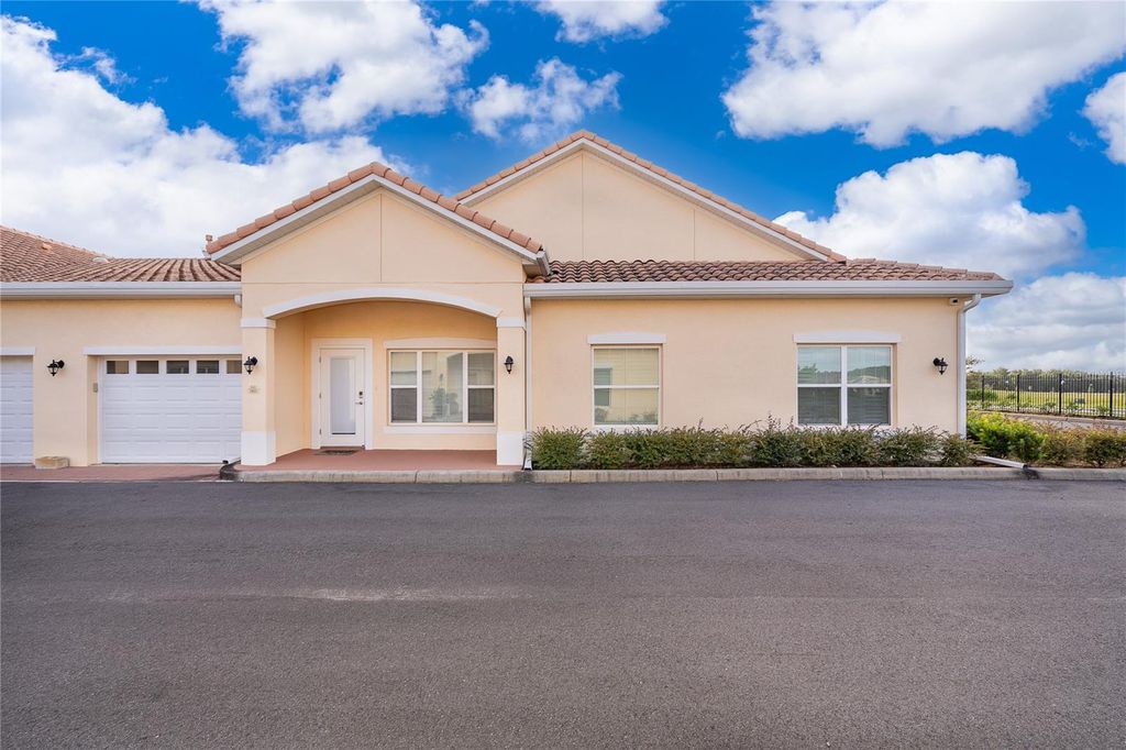 Photo of 2812 Shantiniketan Boulevard #I-12, Tavares, FL 32778 (MLS # O6346905)