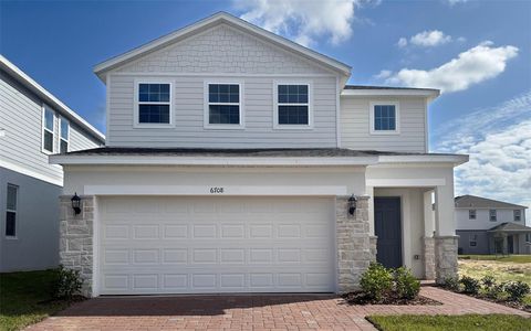 6708 SPOTTED EAGLE LOOP HOWEY IN THE HILLS FL 34737