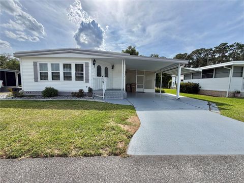 Photo of 115 Bougainvillea Drive, Leesburg, FL 34748 (MLS # G5111980)
