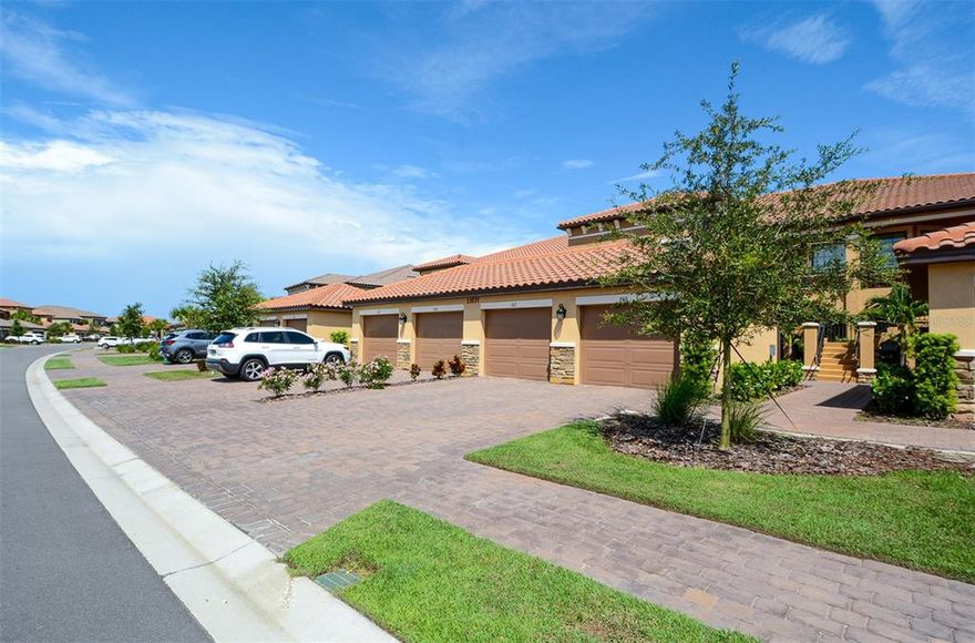BOOKED FOR JAN-MAR 2026. AVAILABLE ALL OFF SEASON MONTHS. Welcome to the Gated Community of Esplanade at Lakewood Ranch! This tastefully furnished 2nd floor 2BR/BA condo is situated on Esplanade's Championship Golf Course. As you walk up the exterior stairs to your private outdoor seating area, you will then enter through the front door and will be met by a bright and open spacious split floor plan with vaulted ceilings, a fully equipped kitchen with stainless steel appliances, granite counters and breakfast area with seating for 4. Leading from the kitchen is the living/dining area, a cozy den with a sleeper sofa and two armchairs. Off the living room is the master bedroom featuring a king-size bed, dresser and side tables, plus a tv, and an ensuite bathroom with a walk-in shower, dual vanities, and a walk-in closet. At the opposite end of the unit is the second bedroom, furnished with a queen size bed, and is located next to the guest bathroom with a single vanity and tub/shower combo. Relax on the furnished screened in balcony with new outdoor furniture and a mounted tv, sip on your morning coffee whilst watching the golfers play or enjoy an evening cocktail as you watch the sunset. This unit also comes with a one car garage which is available for your use during your stay. Enjoy all the Resort Style Amenities, 18 Hole Championship Golf Course, Lagoon Style Pool & Spa with Private Cabanas, Pool Side Bahama Bar, Resistance Pool, 2 Fitness Centers, Formal Dining in the Club Restaurant with Bar Overlooking Golf Course, Pizza Kitchen, Tennis Courts, Bocce Ball, Pickle Ball and much more! Membership Transfer fee is $250/person with $100 processing fee and a separate condo association application fee of $150. Nearby access to I-75, a short drive to UTC Mall where there is an abundance of shopping and dining choices. Take a short drive to the beautiful gulf coast beaches of Anna Maria Island