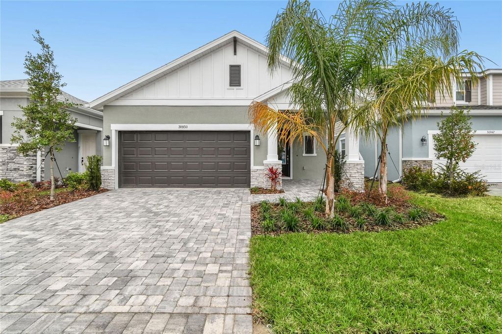 Photo of 30950 Pendleton Landing Circle, Wesley Chapel, FL 33545 (MLS # TB8460308)