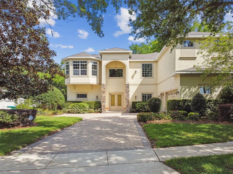 One or more photo(s) has been virtually staged. NEW PRICE! Discover your private oasis in the heart of Maitland, perfectly tucked away on a quiet cul-de-sac within an exclusive gated enclave of only 19 custom homes. Ideally positioned between Lake Sybelia and Lake Catherine, this one-owner estate blends timeless sophistication, modern comfort, and exceptional livability. With five spacious bedrooms, four-and-a-half baths, and a three-car garage, the home showcases soaring ceilings, elegant architectural details, and an open, flexible layout designed for today’s lifestyle. The gourmet kitchen features solid wood cabinetry, a large island, new refrigerator, walk-in pantry, and dual breakfast bars flowing effortlessly into the formal dining and family rooms, where a cozy gas fireplace and custom wet bar create the perfect space for entertaining. Thoughtfully designed for multigenerational living, the residence includes two private wings—one featuring a complete in-law suite with full kitchen, expansive living area, bedroom, bath, and private entrance. Upstairs, the luxurious owner’s retreat offers a loft-style office and sitting area, dual walk-in closets, and a spa-inspired bath. Step outside to a lush tropical paradise where a sparkling saltwater pool with new equipment, papaya trees, and blooming amaryllis create a serene, resort-style ambiance. Additional highlights include a new roof (2023), first-floor laundry with newer appliances, tray ceilings, archways, and low HOA fees. Just minutes from top-rated schools, parks, restaurants, Park Avenue, Hannibal Square and the Winter Park Village, with scenic walkability or a bike ride along Lake Sybelia to local cafés, the Sunday Farmers Market, and the Maitland Art Museum, this exquisite home offers the rare combination of privacy, sophistication, and convenience in one of Central Florida’s most sought-after communities. Schedule your private showing today and experience the extraordinary lifestyle this Maitland masterpiece provides.