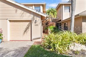 Don’t miss this rare opportunity to own a turn-key, first-floor coach home featuring recently installed hurricane-rated impact glass and an expansive view of Heron Lake, where you can enjoy local wildlife in their natural habitat. Designed with comfort and style in mind, this home features a spacious open floor plan with vaulted ceilings and a neutral color palette. The living area has been expanded to include the original screened lanai, creating a bright, inviting space ideal for relaxation or entertaining. The updated eat-in kitchen is a chef’s delight, with rich wood cabinetry, stainless steel appliances, and granite countertops. The generous primary suite easily accommodates a home office with a stunning lake view, while the renovated ensuite bath offers a large walk-in shower with a frameless glass door, grab bars, and a built-in shower seat. The versatile guest room is equipped with a built-in Murphy bed, making it perfect for hosting visitors or serving as a den or media room when not in use. Additional upgrades include a newer HVAC system and a roof replaced in 2023—providing peace of mind for years to come. Beyond the home, The Landings offers a lifestyle like no other. A short stroll takes you to the Landings Nature Trail, where you can launch your kayak for a journey down the Intracoastal Waterway, cast a line from the private gazebo, or simply relax and watch the boats go by. The Landings Racquet Club is the social hub of the community, offering a state-of-the-art fitness center, library, thermal-heated pool and spa, eight Har-Tru tennis courts, pickleball courts, and an active calendar of events. This home combines elegance, safety, and convenience within one of Sarasota’s most desirable gated communities—don’t miss your chance to make it yours.