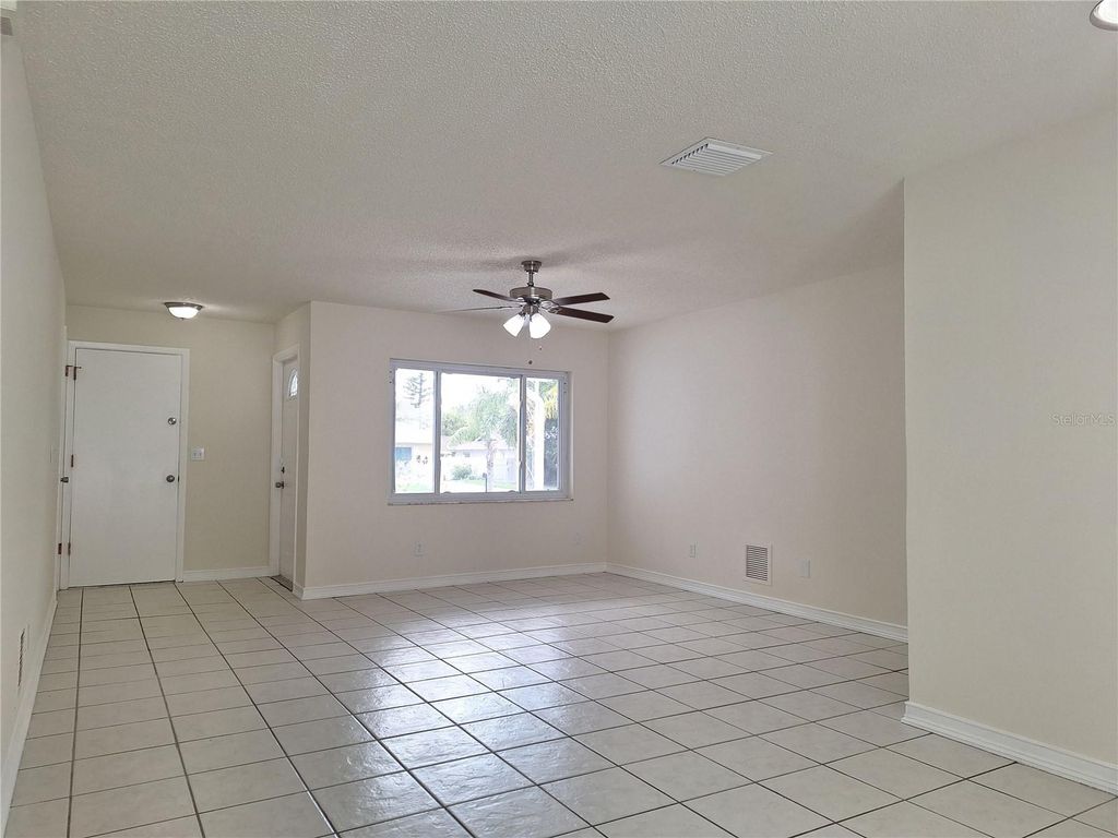 Photo of 1611 Cromwell Drive, Tarpon Springs, FL 34689 (MLS # W7877232)