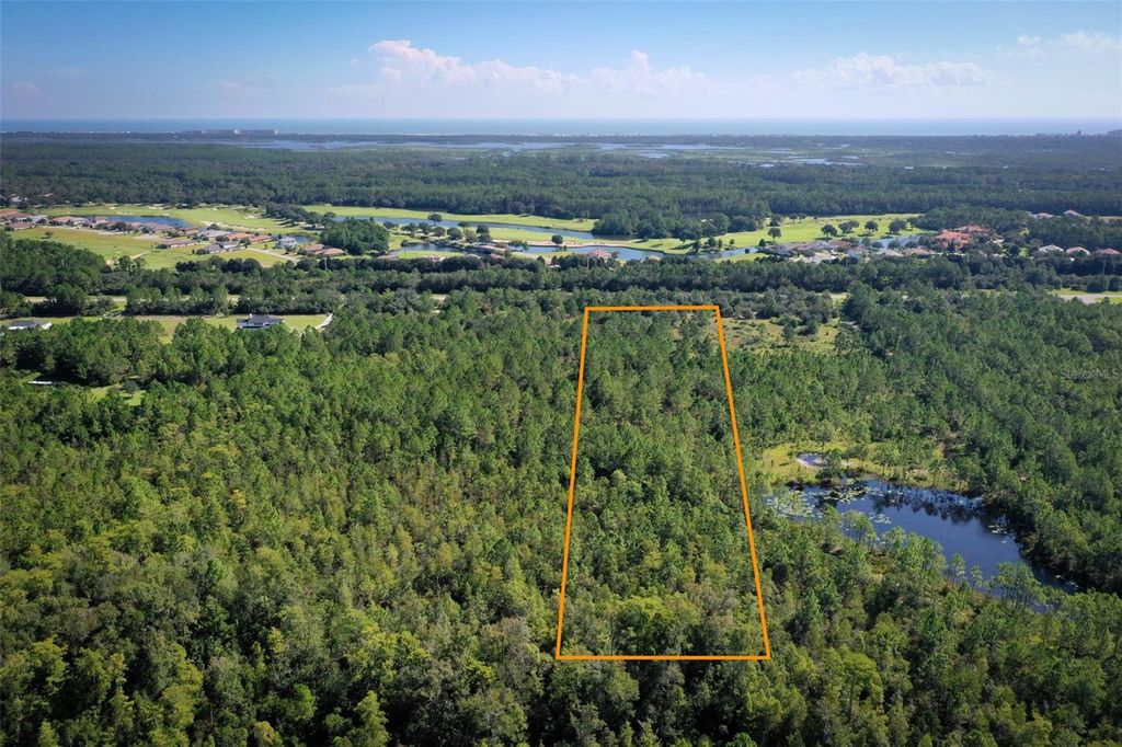 Photo of 4093 Old Kings Road N, Palm Coast, FL 32137 (MLS # FC312822)
