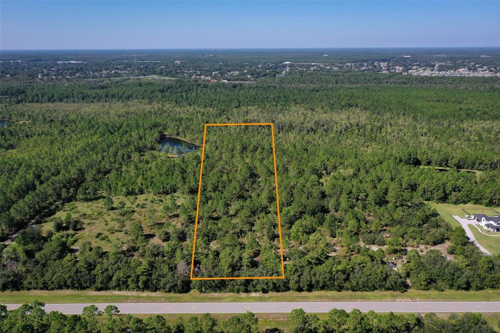 Photo of 4093 Old Kings Road N, Palm Coast, FL 32137 (MLS # FC312822)