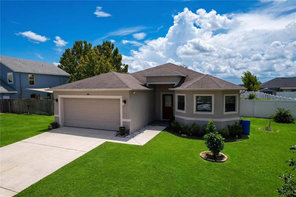 Photo of 418 Majestic Gardens Blvd, Winter Haven, FL 33880 (MLS # B4902351)