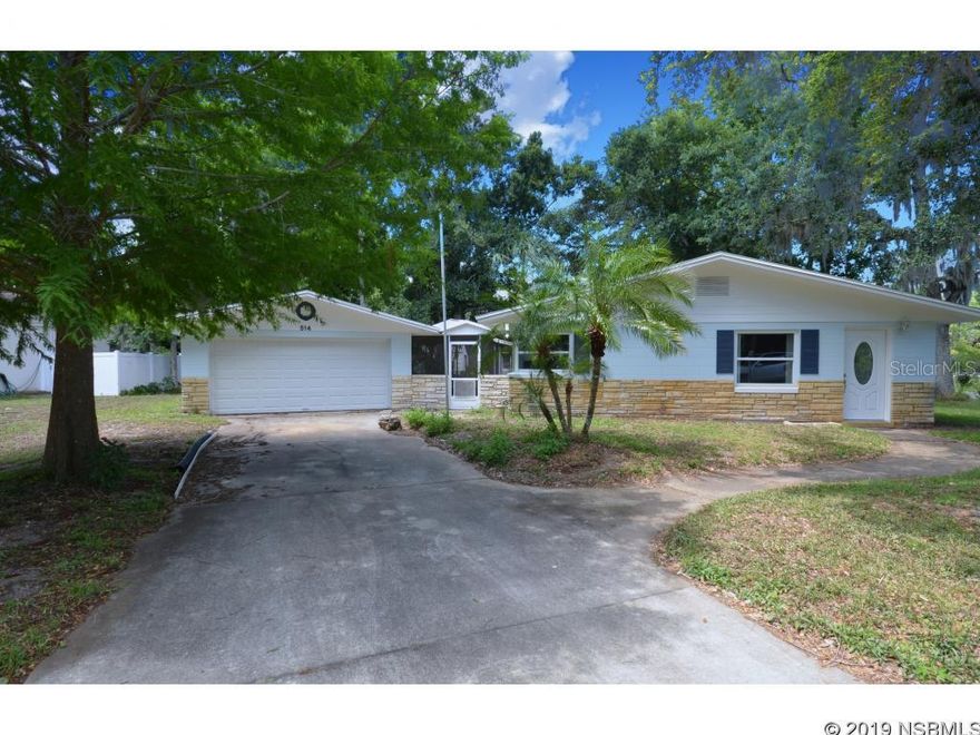 Family Home in Oliver Estates with lovely tree shaded lot.  Over sized two car garage and Screened Breezeway Porch.  Spacious New Kitchen with wood cabinets, granite counters and stainless appliance package.  Central location for access to beach, shopping and restaurants..  House has been freshly painted inside and out.    All windows are double hung vinyl insulated windows with tilt hinge for cleaning.   Kitchen is bright and cheerful with corner window over sink.  Living area is open to the dining area with sliding doors opening from the dining area to the enclosed screened porch.   Master bedroom offers built-in vanity/dressing table as well as sliding doors that open to the screened patio.     Easy care landscaping and maintenance in this block home. ;Water: City