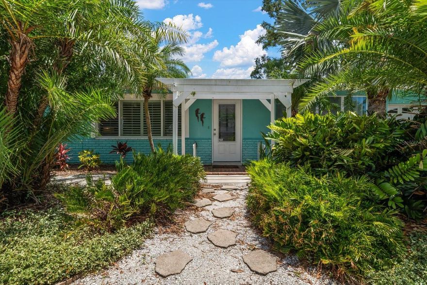 Step into the sunshine and embrace the easygoing Florida lifestyle in this light-filled, beachy bungalow brimming with character and charm. With terrazzo floors throughout, this 3-bedroom, 1-bath home captures the essence of Old Florida while offering modern comfort and versatility.  

The spacious kitchen flows seamlessly into the great room, creating an open and airy layout that's perfect for entertaining or relaxing. A bright and cheery Florida room offers endless possibilities—think home office, yoga studio, art space, or cozy reading nook. An additional "beach bath" in the garage adds convenience after outdoor adventures.

Step outside to your own tropical oasis with an inviting back patio, covered cabana, outdoor shower, and crushed shell landscaping surrounded by lush native palms. The fully fenced yard sits on a wide lot, with plenty of side yard and driveway space for your boat trailer, extra vehicles, or other toys.

Located on one of Dunedin’s coveted brick streets, just minutes from the vibrant shops and restaurants of Downtown Dunedin, and less than 10 minutes to the white sands of Honeymoon Island. Whether you're looking for your first home, a sunny vacation getaway, or a laid-back full-time residence, this Florida gem offers the perfect blend of charm, space, and coastal convenience.

NEW ROOF 2026!!