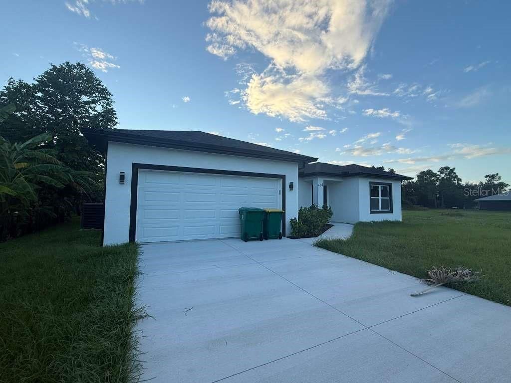 Photo of 407 Harbor Boulevard, Port Charlotte, FL 33954 (MLS # O6377586)
