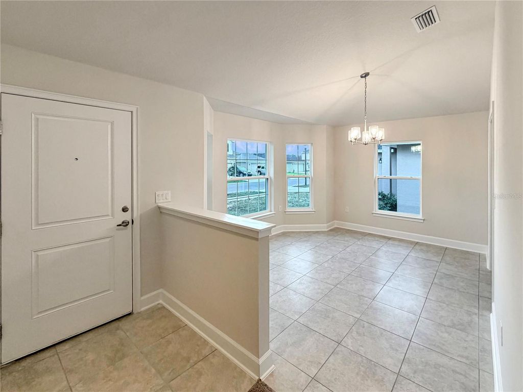 Photo of 7528 Bent Tree Loop, Saint Cloud, FL 34773 (MLS # O6372876)