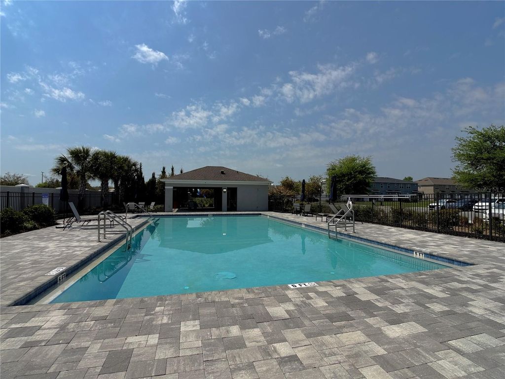 Photo of 771 Spring Palms Loop, Orlando, FL 32828 (MLS # O6394241)