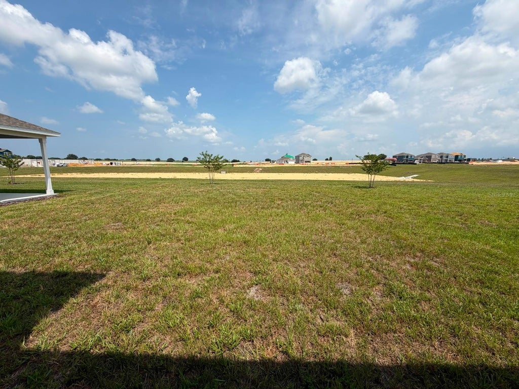Photo of 6020 Wellbeing Way, Clermont, FL 34714 (MLS # O6436192)