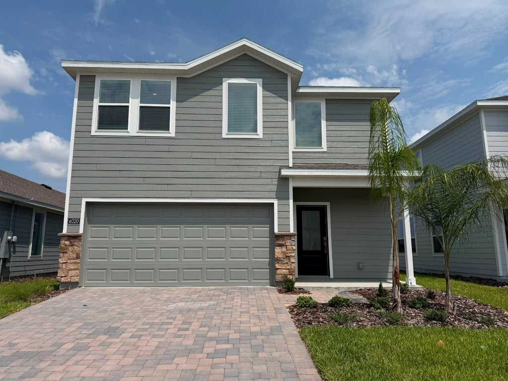 Photo of 6020 Wellbeing Way, Clermont, FL 34714 (MLS # O6436192)