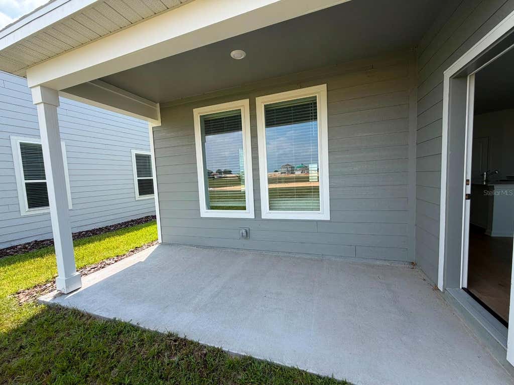 Photo of 6020 Wellbeing Way, Clermont, FL 34714 (MLS # O6436192)