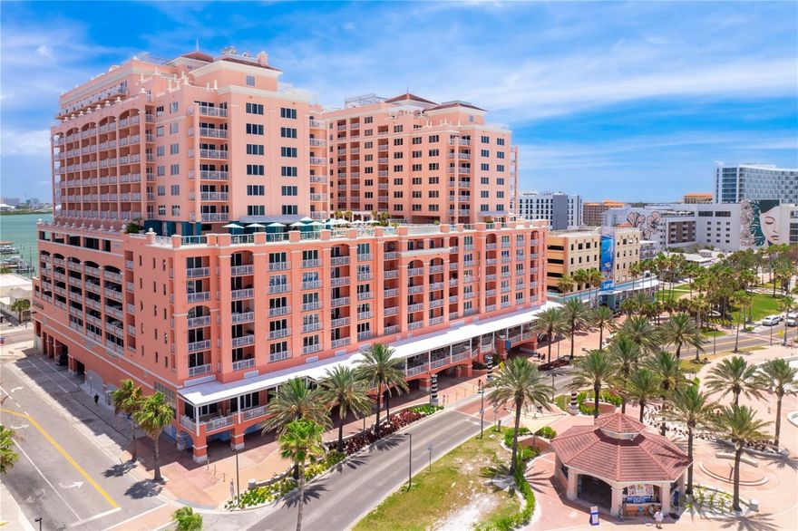 Experience elevated coastal luxury at Aqualea Residences at Hyatt Regency Clearwater Beach in this exceptional beachfront residence offering an extraordinary blend of sophistication, privacy, and resort-style living. Expansive wraparound terraces showcase breathtaking panoramic views of the Gulf, Clearwater Beach, Pier 60 and unforgettable sunsets, creating a setting for seamless indoor and outdoor living. A private elevator opens directly into your exclusive foyer, welcoming you into an extraordinary residence defined by refined coastal elegance, expansive living spaces and spectacular Gulf-front views. Floor-to-ceiling glass fills the home with natural light while capturing stunning water views from nearly every room. The open-concept design offers a balance of luxurious comfort and effortless entertaining. The gourmet chef’s kitchen is beautifully appointed with premium appliances, custom cabinetry, elegant stone surfaces and an oversized entertaining island flowing seamlessly into the spacious dining area. The luxurious owner’s retreat serves as a private sanctuary featuring balcony access, oversized walk-in closets, and a spa-inspired bath designed for relaxation and tranquility. Spacious guest suites provide comfort and privacy for family and visitors alike. Residents enjoy the exclusivity of boutique luxury living with premier amenities including a rooftop heated pool and spa, fitness center, private residential entrance, secured parking, valet services and access to Hyatt Regency resort amenities. Designed for those who appreciate elegance, privacy and finest in beachfront living, this exceptional residence offers an elevated coastal lifestyle. Positioned near the white sands of Clearwater Beach, fine dining, shopping, marinas and entertainment, this extraordinary residence offers the ultimate in luxurious beachfront living with convenient access to Tampa International and St. Pete-Clearwater airports. This is Clearwater Beach luxury at its finest. Be sure to preview the video tour.