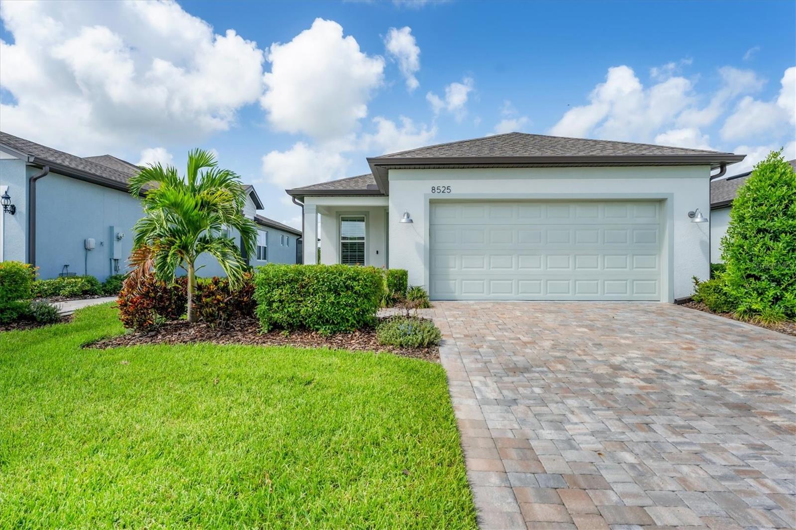 Seasonal owners who lightly utilized this home, came down to visit grandchildren and fell in love with another house in the community they love! In an effort not to own TWO homes in Bay View, they have priced aggressively for a quick sale! Big conservation view pulls you into the home and outside to the extended screen lanai. Sellers had originally planned to install a pool but now? Maybe the next house. From the entry, the full glass front door will welcome you home. All interior features were carefully selected- Plantation shutters, the no see'um screened lanai and birdcage, the wide vinyl plank flooring, thick, quality quartz on all countertops, frameless glass surround for the primary shower, cabinetry in the laundry room. Pendants, coach lights, and ceiling fans are all here for you to enjoy immediately. Del Webb Bay View is a truly active community where you immediately feel welcomed. There are more clubs and activities than you can imagine; you can be as busy as you want to be. Located 1.5 miles from I-75 and 275, there is shopping and dining just a quick drive in any directions. Come for the solidly built home, stay for the community!