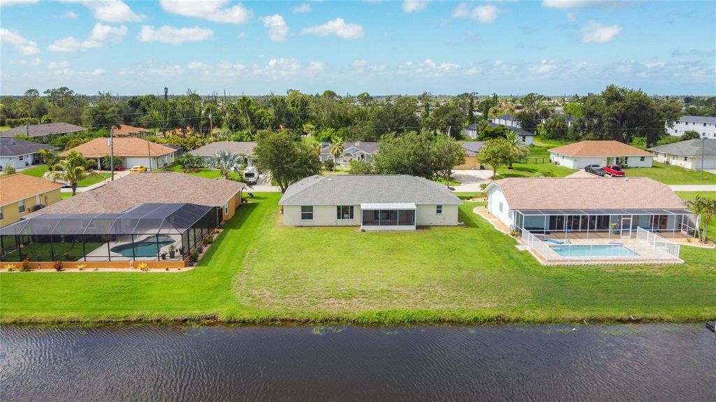 Photo of 104 Mark Twain Lane, Rotonda West, FL 33947 (MLS # D6142852)