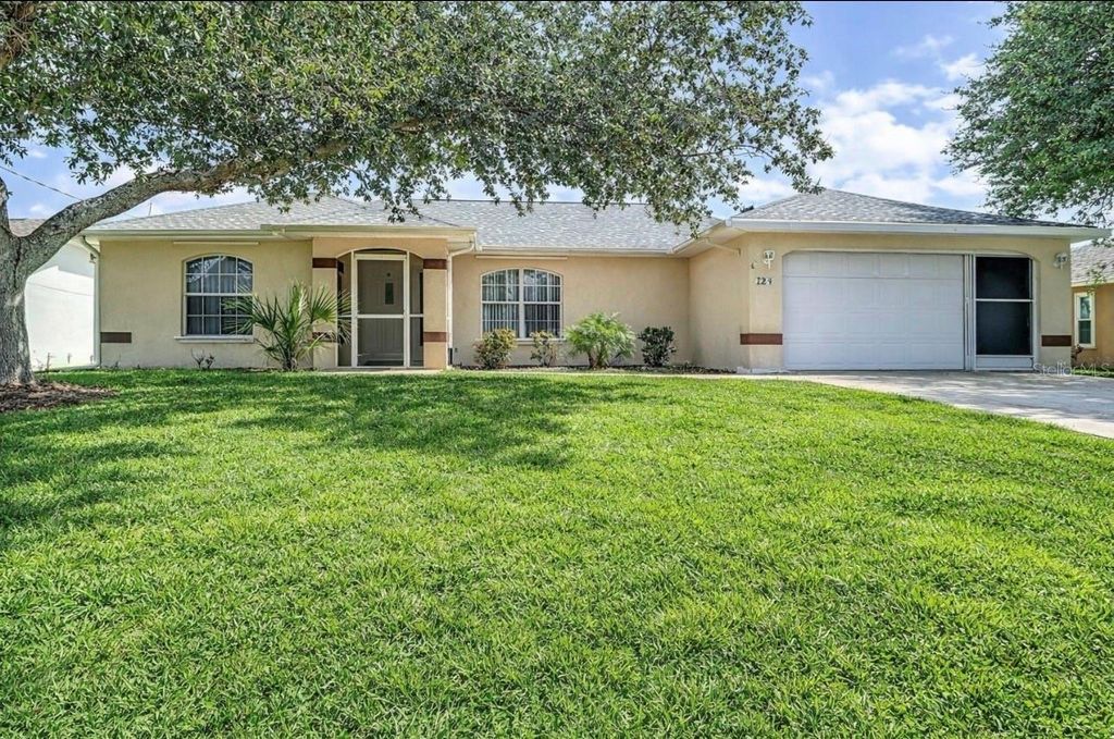 Photo of 104 Mark Twain Lane, Rotonda West, FL 33947 (MLS # D6142852)