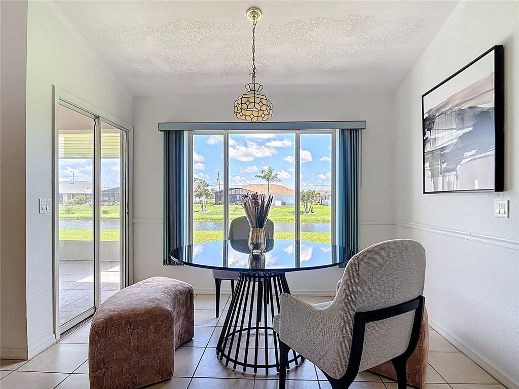 Photo of 104 Mark Twain Lane, Rotonda West, FL 33947 (MLS # D6142852)