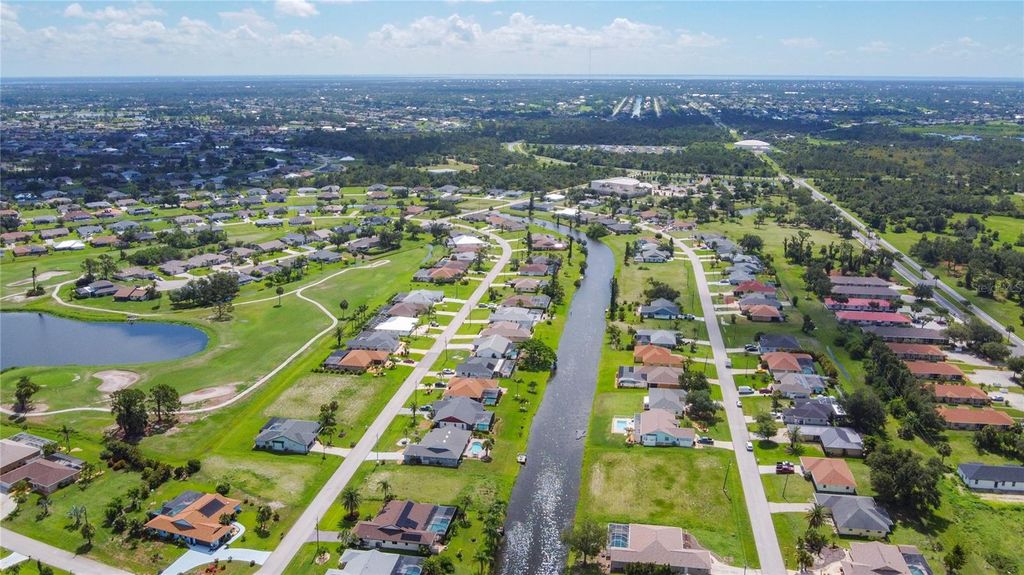 Photo of 104 Mark Twain Lane, Rotonda West, FL 33947 (MLS # D6142852)