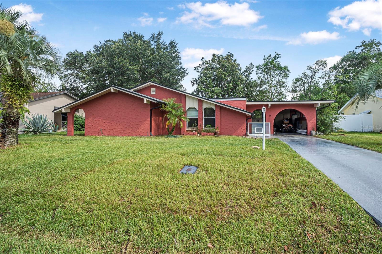 Welcome to 54 Farragut Drive, Palm Coast, FL 32137 — This move-in-ready home has been thoughtfully updated with a brand-new roof, new A/C units (inside and out), freshly painted interior and exterior, updated countertops, and a new privacy fence enclosing the spacious backyard. These recent upgrades provide comfort, value, and peace of mind to the next lucky owner.
Step inside to a large kitchen, perfect for hosting gatherings, with ample counter space and functionality. The split floor plan offers privacy between the oversized master suite and the secondary bedrooms—ideal for families or guests. Enjoy indoor-outdoor living with a generously sized screened-in porch, great for relaxing or entertaining, and a huge backyard with plenty of room for pets, play, and even the possibility of adding a pool. The master bedroom is impressively large, offering a true retreat with room for a sitting area or workspace.
Located in a quiet, established neighborhood close to shopping, schools, and beautiful Flagler beaches, this home blends style, space, and location.
Don’t miss your chance to own this beautifully updated Palm Coast gem—schedule your private showing today!