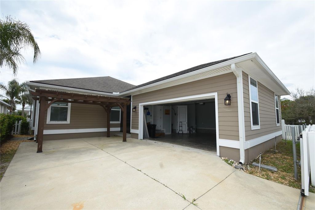 Photo of 28 Sandy Beach Way, Palm Coast, FL 32137 (MLS # FC317973)
