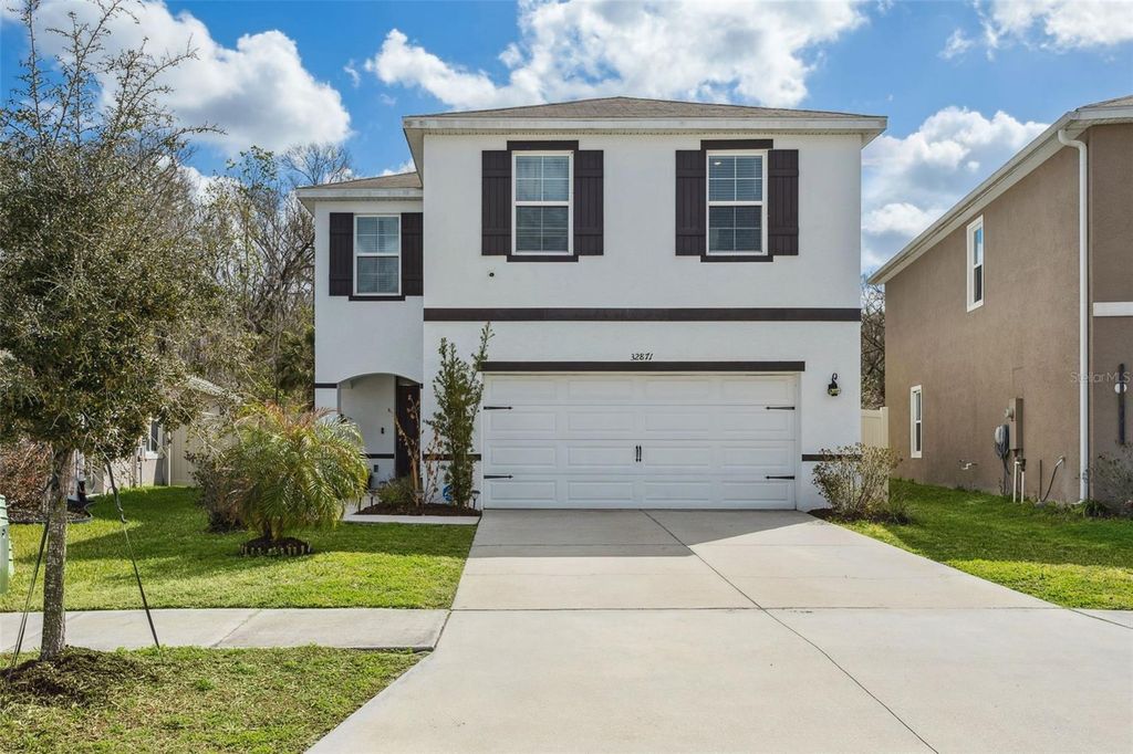 Photo of 32871 Brooks Hawk Lane, Wesley Chapel, FL 33543 (MLS # TB8477768)