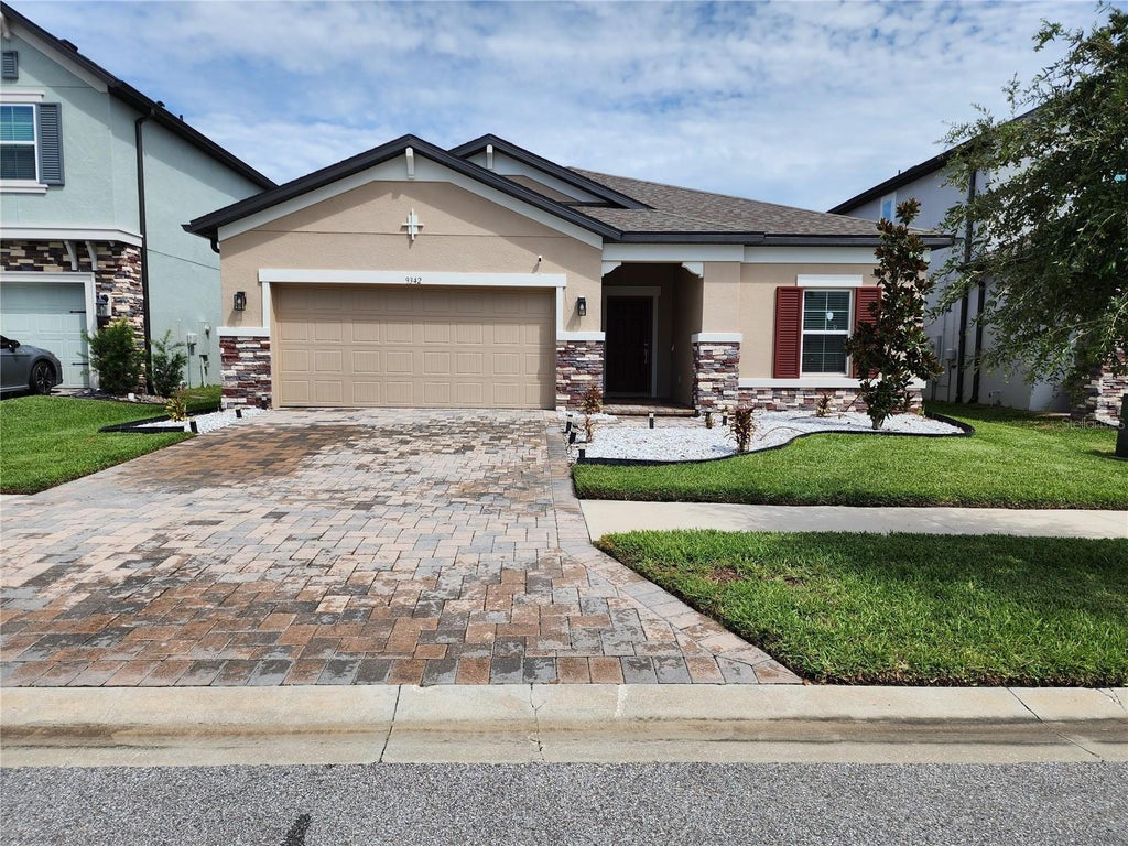 Photo of 9342 Crescent Ray Drive, Wesley Chapel, FL 33545 (MLS # TB8548126)