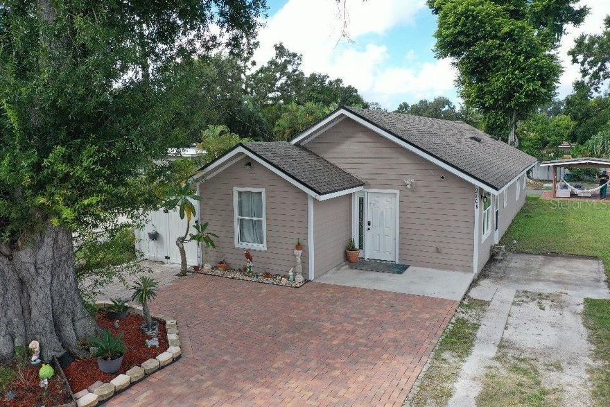 Welcome to this beautifully updated 4-bedroom, 3-bath corner-lot home in the heart of Bradenton! 

This property truly stands out — fully fenced, surrounded by mature fruit trees, and featuring its very own private playground, a gazebo perfect for BBQs and family gatherings, and a large above-ground pool, ideal for enjoying Florida’s sunny days! 
Inside, you’ll find a bright open layout, spacious bedrooms, and modern updates throughout — including a new roof (2022), new A/C (2022), and updated plumbing. The home also offers a functional laundry area with cabinets, utility sink, and shoe storage, combining style and practicality.
The corner lot provides extra parking, privacy, and flexibility — no HOA and no CDD!
Perfect as a primary residence or investment, this property blends comfort, outdoor living, and unbeatable value.
 Located close to schools, shopping, and just minutes from downtown Bradenton and the Riverwalk. Don’t miss this gem — schedule your showing today!