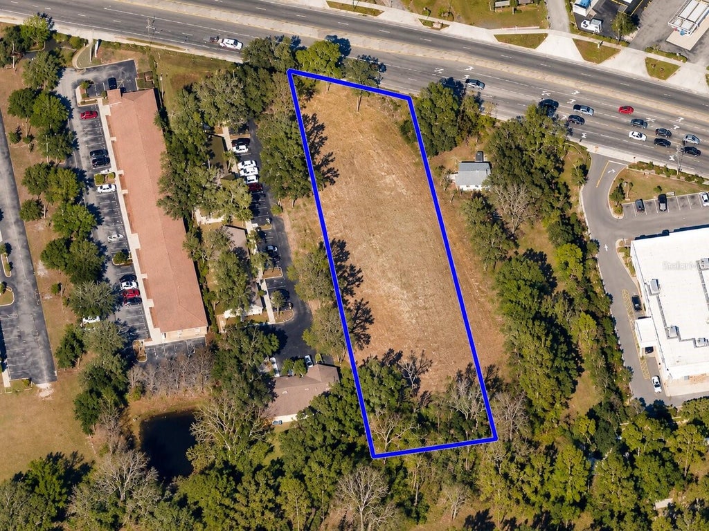 Photo of 7250 Curry Ford Road, Orlando, FL 32822 (MLS # O6446383)