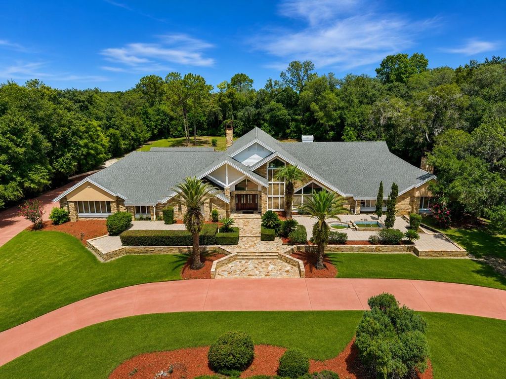 Photo of 1041 Sweetwater Club Boulevard, Longwood, FL 32779 (MLS # O6425075)