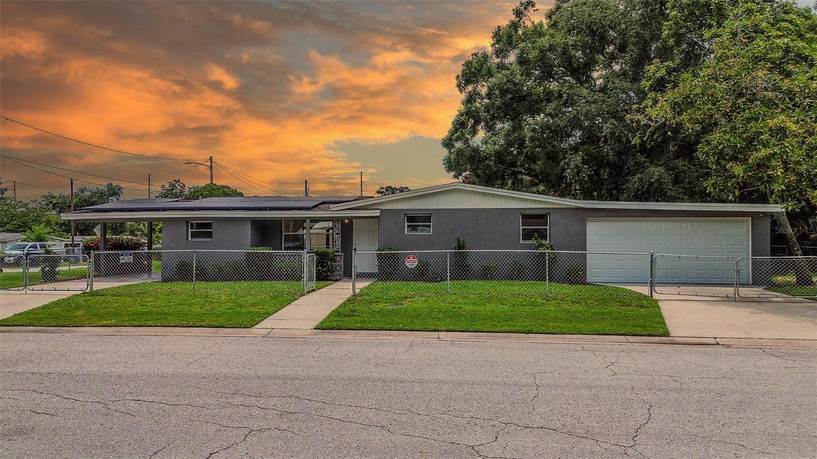 Welcome to this charming 3-bedroom, 1-bathroom home located in the desirable area of Tampa, Florida. Built in 1965, this residence has been thoughtfully designed with modern comforts and a functional layout. The home features a spacious 1,069 square feet of heated living space, making it ideal for a family or anyone looking for a comfortable, move-in-ready property.
As you step inside, you'll immediately notice the open and inviting feel, enhanced by the ceramic tile flooring that runs throughout the home. The living room and dining room combo offer a great space for relaxing or entertaining guests. The kitchen is perfect for meal preparation, with ample counter space and essential appliances, including a range, range hood, and refrigerator. It also includes an eating space where you can enjoy casual meals.
The primary bedroom, along with two additional bedrooms, all feature built-in closets, providing plenty of storage for your belongings. The bathroom is easily accessible, and the laundry room is conveniently located outside, allowing for additional space inside the home.
This property sits on a corner lot, with a generous 6,667 square feet of space, giving you plenty of room to enjoy outdoor activities or expand your landscaping ideas. The exterior of the home features a brick and concrete construction, providing durability and a classic aesthetic. The roof is made of shingle, and the home has a block foundation, adding to its long-lasting structure.
Outdoor living is made easy with the front porch, patio, and screened areas, perfect for enjoying Florida's beautiful weather. Whether you're sipping your morning coffee or hosting a barbecue, these outdoor features enhance the overall appeal of this property.
Additional highlights of the property include a garage with space for two cars and a carport for one. The home is pet-friendly, allowing both cats and dogs, so your furry friends will feel right at home. The lot also features wire fencing, ideal for pet owners or those who appreciate a sense of privacy.
This home is located in a flood zone X area, providing added peace of mind. It is also equipped with public utilities such as water, sewer, electricity, and cable, ensuring a hassle-free living experience. The community does not have an HOA, allowing for more freedom and flexibility for the homeowner.
If you're searching for a home that combines comfort, practicality, and a welcoming atmosphere, this property is a must-see.
