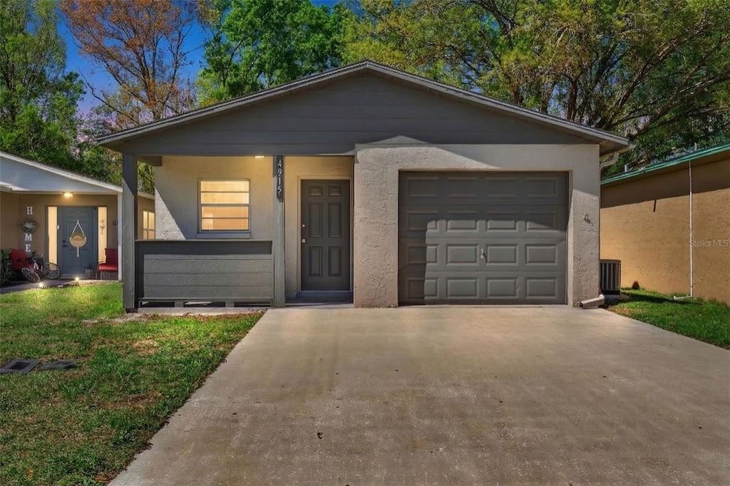 Photo of 4915 Billy Direct Lane, Lutz, FL 33559 (MLS # TB8488278)