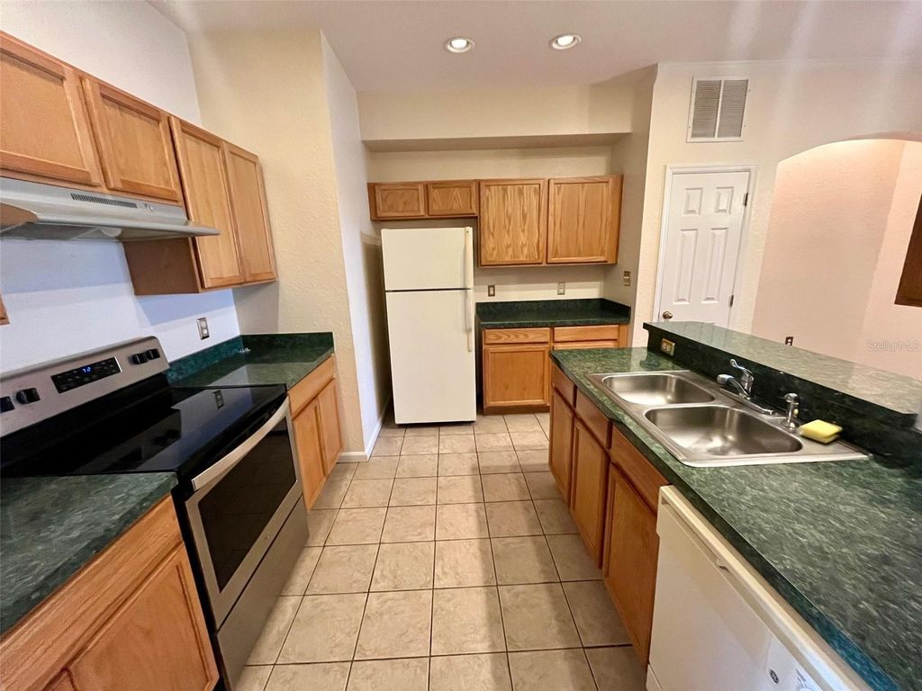 Photo of 3104 Ashland Lane N, Kissimmee, FL 34741 (MLS # S5142362)