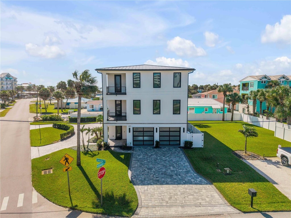 Photo of 409 Lincoln Avenue, New Smyrna Beach, FL 32169 (MLS # O6452751)