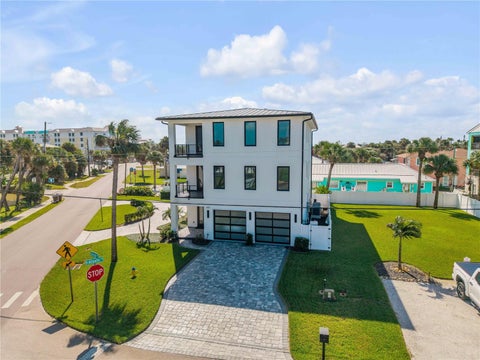 Photo of 409 Lincoln Avenue, New Smyrna Beach, FL 32169 (MLS # O6452751)