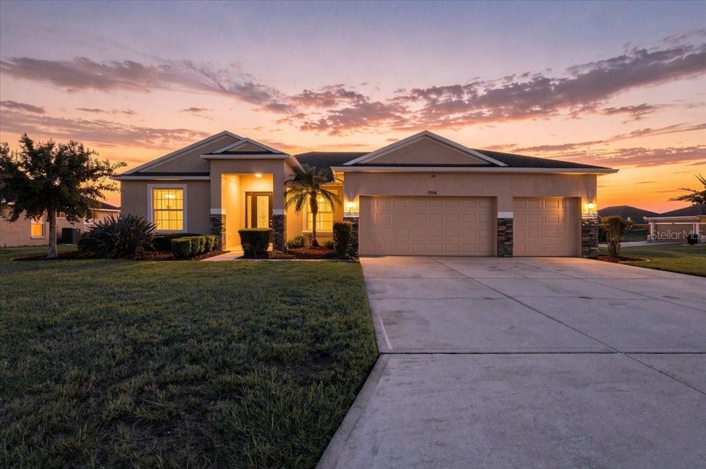 Photo of 7384 Huntington Summit Boulevard, Lakeland, FL 33810 (MLS # L4964902)