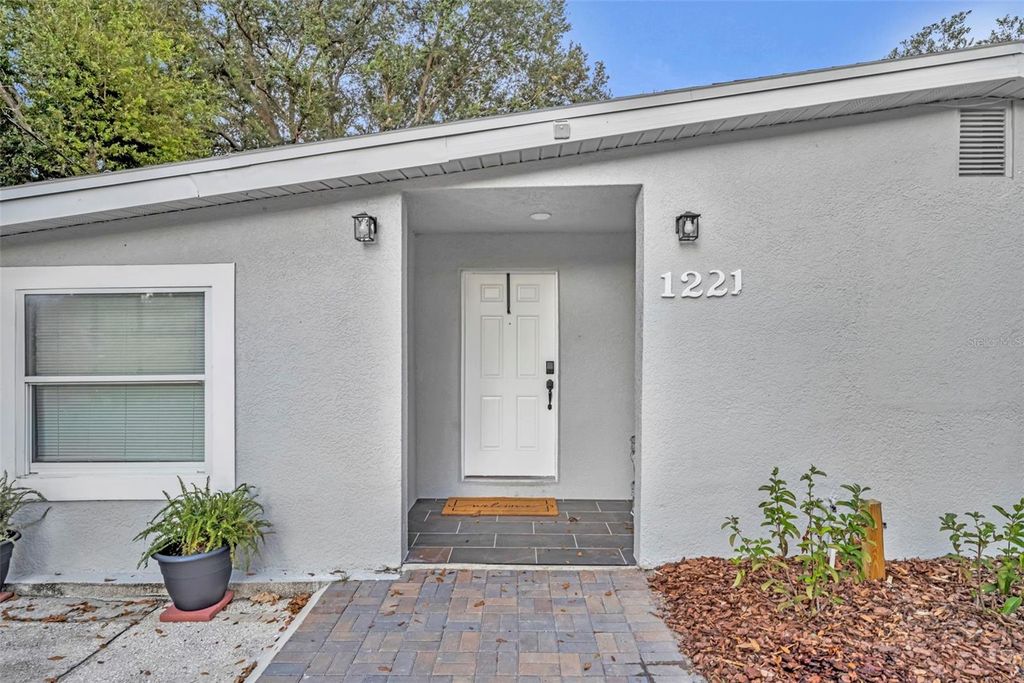 Photo of 1221 Elinore Drive, Orlando, FL 32808 (MLS # O6423646)
