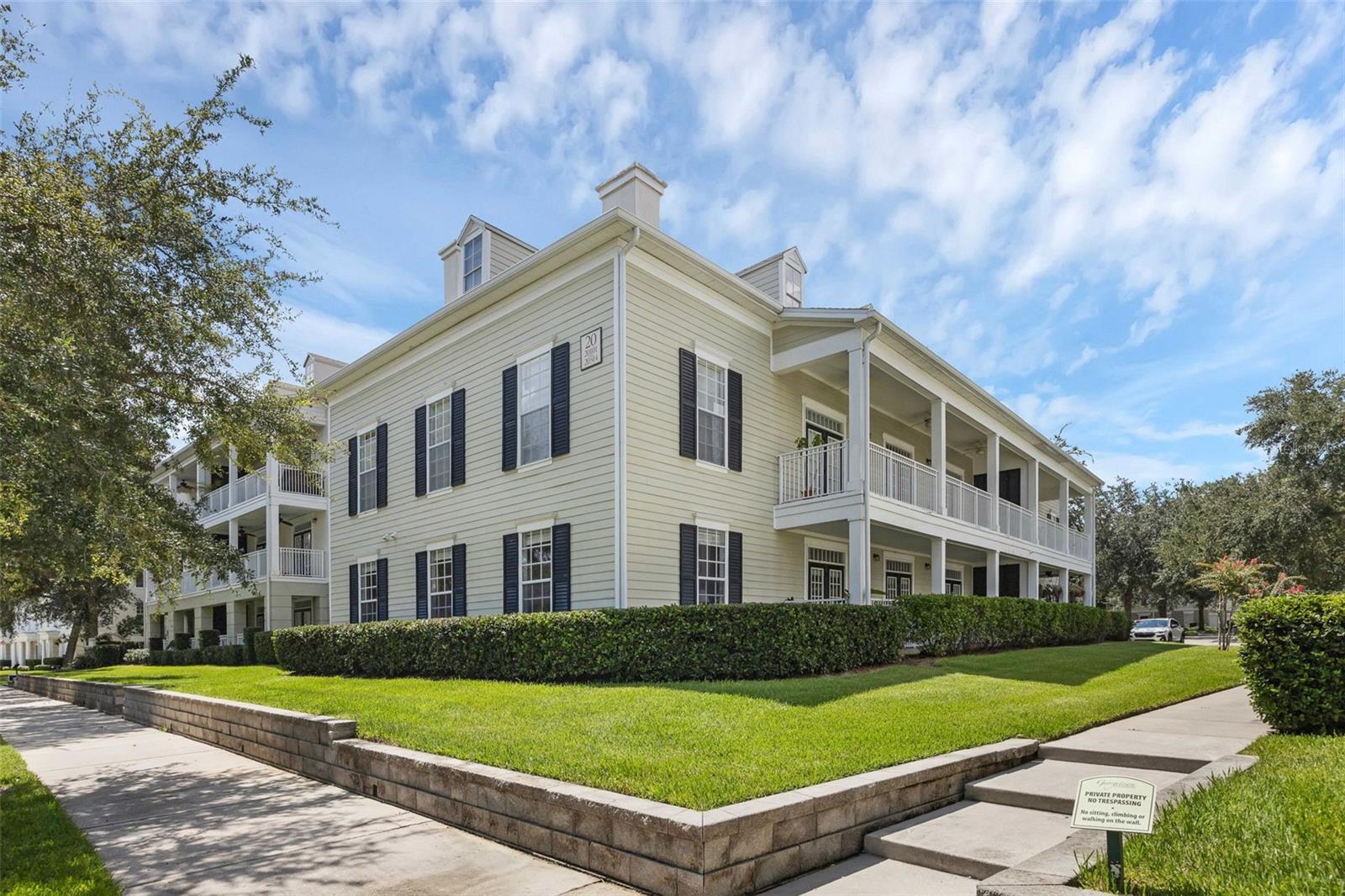 Welcome Home to a Rare Find — a Four Bedroom/Three Bath Ground-Floor Condo Featuring an Oversized Balcony Located in the Georgetown Community in Celebration, Florida! This light and bright condo is an end-unit that offers a spacious great room with crown molding and French doors leading to the balcony, a cheery kitchen with a breakfast bar, and an office nook off the foyer. The primary bedroom is the perfect place to relax with a garden tub in the bathroom and French doors that open to the balcony, where you can enjoy your morning coffee or evening beverage. The second bedroom also has French Doors leading to the balcony and boasts a large closet. The third bedroom has a walk-in closet and an en-suite bathroom and the fourth bedroom includes a walk-in closet and private access to the third bathroom, which has dual sinks and a walk-in linen closet. You'll love all that Georgetown has to offer — a beautiful clubhouse with a fitness center and resort-style pool, a grilling area, cabana, carwash station, play area, tennis/pickleball courts, and valet trash service. In Celebration, the town developed by Disney, you will find walking trails, an abundance of parks and conservation areas, six community pools, basketball courts, a gorgeous golf course, a dog park, and a cool downtown area filled with shops, restaurants, and a stunning Inn. 315 Grand Magnolia, Unit #304 is a wonderful place to call home!