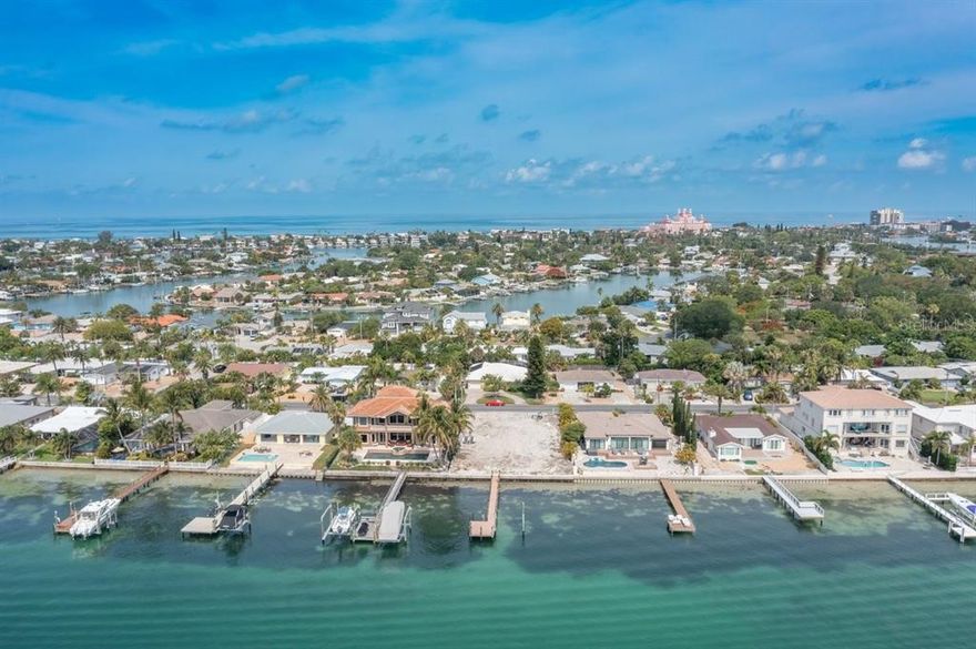 The only vacant lot in sought after Vina del Mar neighborhood!  Spectacular views of Tierra Verde and Sunshine Skyway Bridge, plus minutes away by boat from Gulf of Mexico for beautiful sunsets.  Enjoy the gulf breezes while watching sea life and boats go by on the intercoastal waterway.  A short golf cart ride to Pass a Grille shops, restaurants and of course the beach!