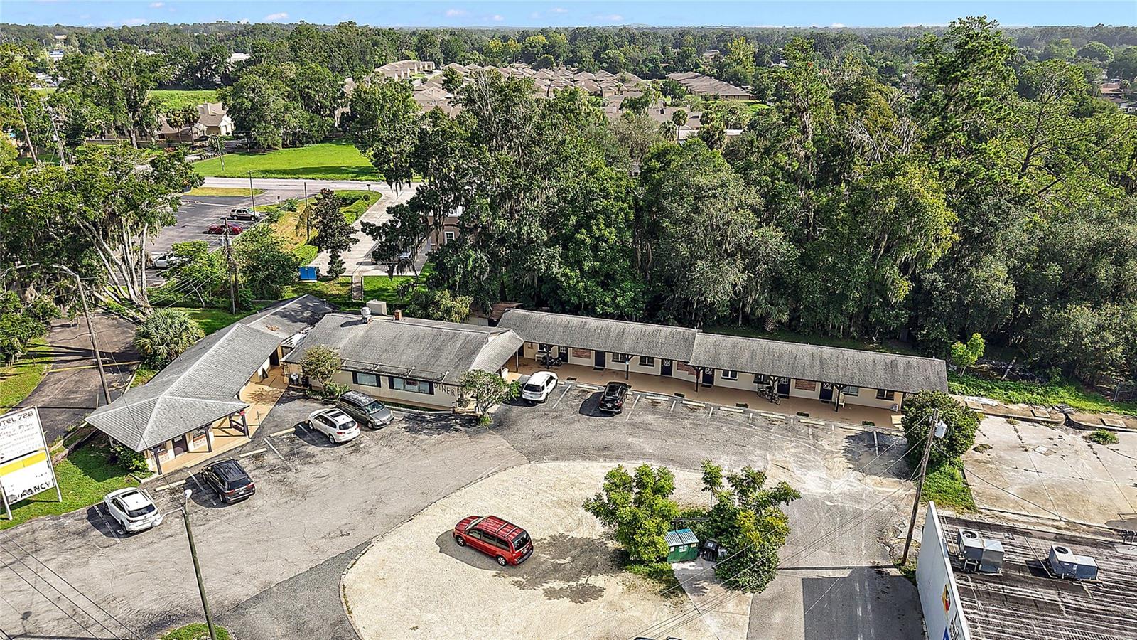 Investor Alert with current 7%+/- CAP rate! 3 Building / 3 Tenant property that is 100% occupied and located along busy U.S. Hwy. 441 in Belleview. Ideally situated between The Villages and Ocala, two of the fastest growing areas in Florida. Tenants include a Diner that has been in place 20+ years, a Barber Shop of which the space was remodeled recently and includes new AC, flooring and windows and a Motel. Great opportunity to own an income producing property in a great location. Showings by appointment only. DO NOT DISTURB TENANTS. All information is believed accurate and correct but not guaranteed or warranted and subject to change without notice.