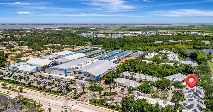 Welcome to 3409 54th Dr W Unit 102—an exceptional and rarely available townhome in the prestigious Bollettieri Resort Villas at IMG Academy. With 3,046 sq ft of fully renovated living space, this is one of only eight townhomes in the community and one of the largest units available. Offering 3 bedrooms, an office/den and 4 full bathrooms, this spacious residence features three bedrooms upstairs—including an expansive primary suite—and a versatile first-floor office that can be utilized as or converted to a 4th bedroom, with an adjacent full bath, ideal for guests or a work-from-home setup.

No detail has been overlooked in the recent top-to-bottom renovation. Updates include new luxury vinyl flooring throughout, modern LED lighting, updated bathrooms with stylish tub-to-shower conversions, new countertops, sinks, and faucets in both the kitchen and baths, and fresh paint inside and out in 2024. The home is equipped with newer AC units (2023) and water heaters (2025), and a solar power and battery system (Terra Energy) was recently installed for energy efficiency and peace of mind. Updated appliances include the refrigerator (2023), dishwasher (2025), washer and dryer (2023).

This fully furnished property is move-in ready and includes new TVs, updated furniture, plantation shutters, and fitness equipment such as a Peloton bike, Peloton treadmill, and free weights. Enjoy your private backyard patio, with Weber grill, and outdoor furniture—perfect for entertaining or relaxing in the Florida sun. The property also includes two covered carports with new awnings, and front and rear security lighting and cameras. Residents of Bollettieri Resort Villas enjoy exclusive access to a private community clubhouse, pool and spa, just a short distance from the unit—offering the perfect place to unwind or connect with neighbors.

Located adjacent to IMG Academy, this home is ideal for families, investors, or those seeking luxury, convenience, and comfort in a gated, resort-style community. Don’t miss this rare opportunity to own a fully upgraded townhome in one of Bradenton’s most sought-after locations.