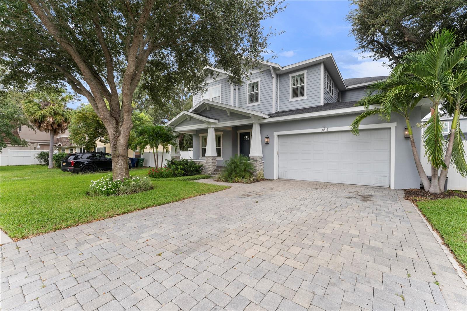 One or more photo(s) has been virtually staged. Welcome to this stunning South Tampa home in the highly sought-after Plant High School district! From the moment you arrive, you’ll notice the mature trees and tropical landscaping that give the home such a warm and inviting curb appeal. Step inside and you’re greeted by a smartly designed 4-bedroom, 4-bath layout filled with thoughtful details and high-end finishes.
Let’s start with the heart of the home—the oversized gourmet kitchen! Here you’ll find Bosch appliances, a built-in oven and microwave, 42-inch cabinets with glass displays and crown molding, plus extras like a veggie sink, beverage fridge, and stylish pendant lighting. The kitchen flows right into the spacious great room, where oversized pocket sliders open to a gorgeous travertine lanai and fully fenced backyard—an entertainer’s dream and the perfect place to relax under the stars.
On the first floor, there’s a full guest suite with a private bath, a charming mudroom with wainscoting, and even a formal dining space that’s been converted into a home office. Head upstairs and you’ll find the primary suite—a true retreat with a spa-like bath featuring a garden tub, standalone shower, dual sinks, and a custom walk-in closet by Closet by Design. A bonus room and additional bedrooms give you plenty of space to spread out and make the home your own.
Other highlights include a tandem three-car garage, plantation shutters, recessed lighting throughout, crown molding, and 5¼-inch baseboards. All of this is set in one of Tampa’s most desirable neighborhoods, just minutes from top-rated dining, shopping, and entertainment.
This home isn’t just beautiful—it’s practical, welcoming, and ready for you to move right in!