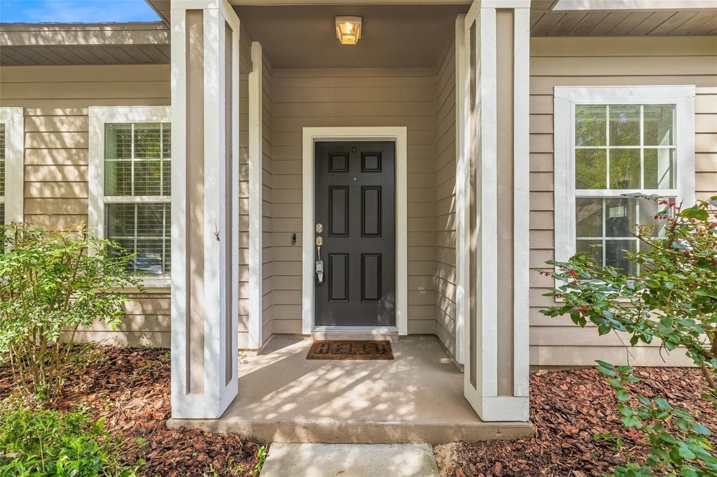 Photo of 7458 SW 79th Drive, Gainesville, FL 32608 (MLS # GC543608)