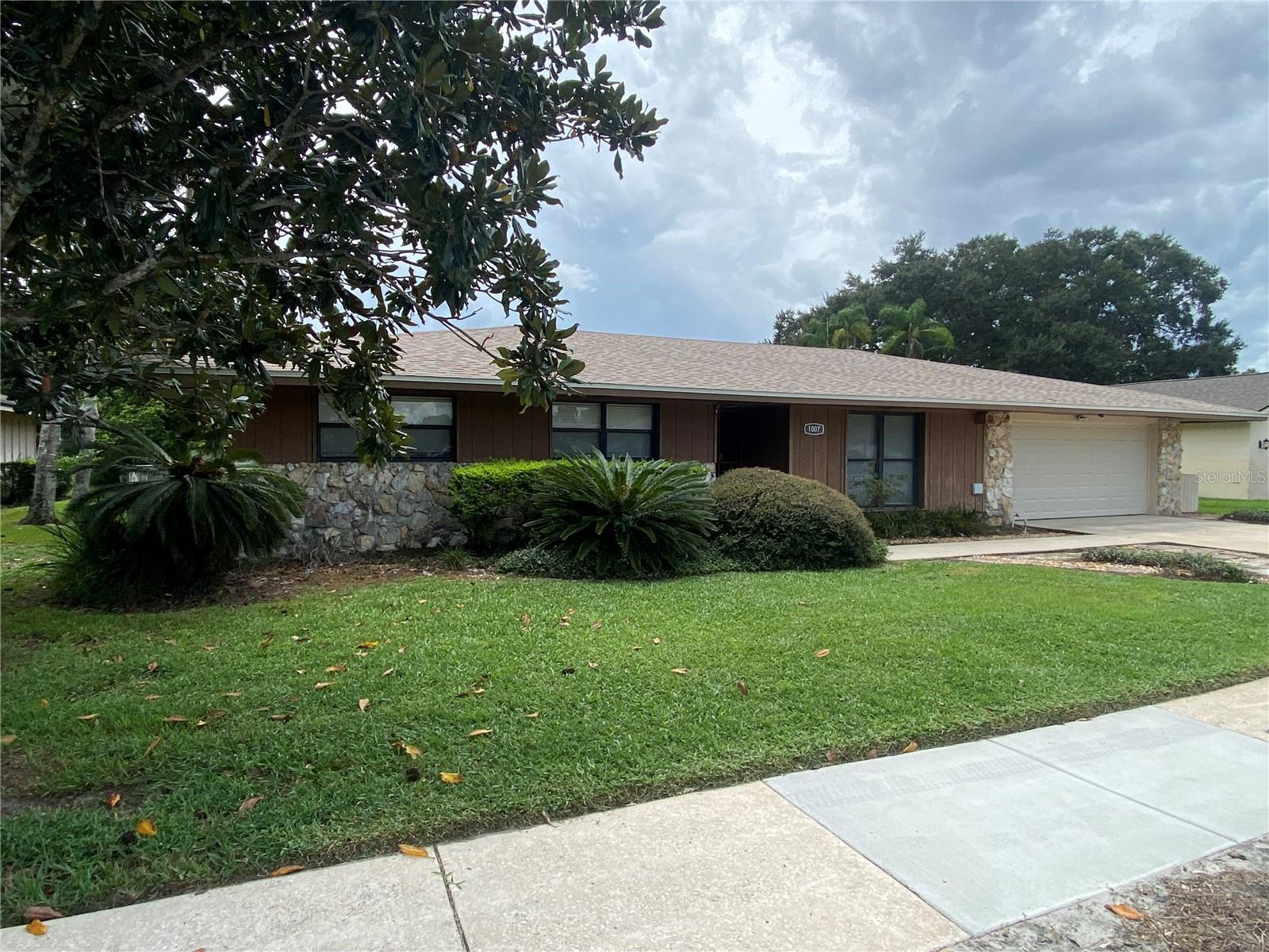 Fantastic 3 bed/2 bath salt water pool home in Winter Park! Don't want to maintain a pool and yard? Worry free living with pool and lawn care included! Surrounded by a beautiful paver patio in a large fenced-in yard, you'll love the luxury pool which is just steps from a tremendous screened porch perfect for relaxing after a long day or gathering with family or friends on the weekends. Large living spaces, master bedroom, and a guest bedroom floors are covered with that attractive Wood-Look ceramic tile. Kitchen is equipped with a breakfast nook and plenty of cabinet space for all of your cooking and storage needs. Bright and airy, the french doors accent the open dining room and family room layout and lead out to that large screened porch you see in the photos—the master suite also has French doors that lead out to the porch. Call today to schedule a viewing!