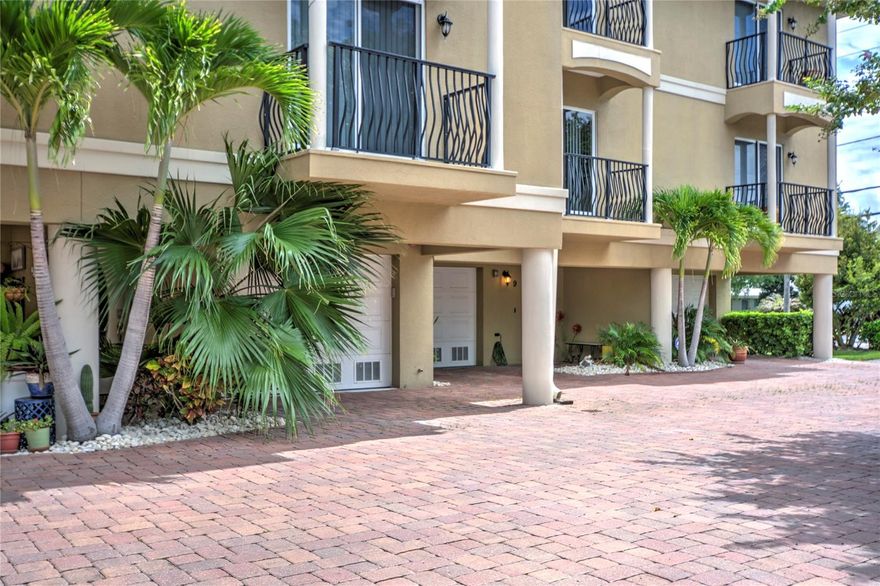 Three month minimum renta! Your vacation will be remarkable and a perfect stay-cation in this amazing waterfront townhome! WALK TO THE BEACH!!! Fully furnished, the space is open and inviting with plenty of room for everyone! NEW FLOORING throughout. Private elevator inside to get to every floor. Extra features include a 3 car garage, huge balconies, laundry in unit, and plenty of storage closets. The open concept living area has a large sectional sofa, and large flat screen television with cable, as well as WIFI. There are three spacious bedrooms in this home, which all feature en-suite bathrooms. There is a heated pool for your use just steps from your patios, and the beach is close by for nightly sunsets.